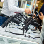 Gun Display Stands. Pistols for sale in the store.