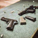 Modern Pistols And Gun Cartridges At Gun Training Range