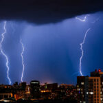 Thunderstorm with lightning over the night city